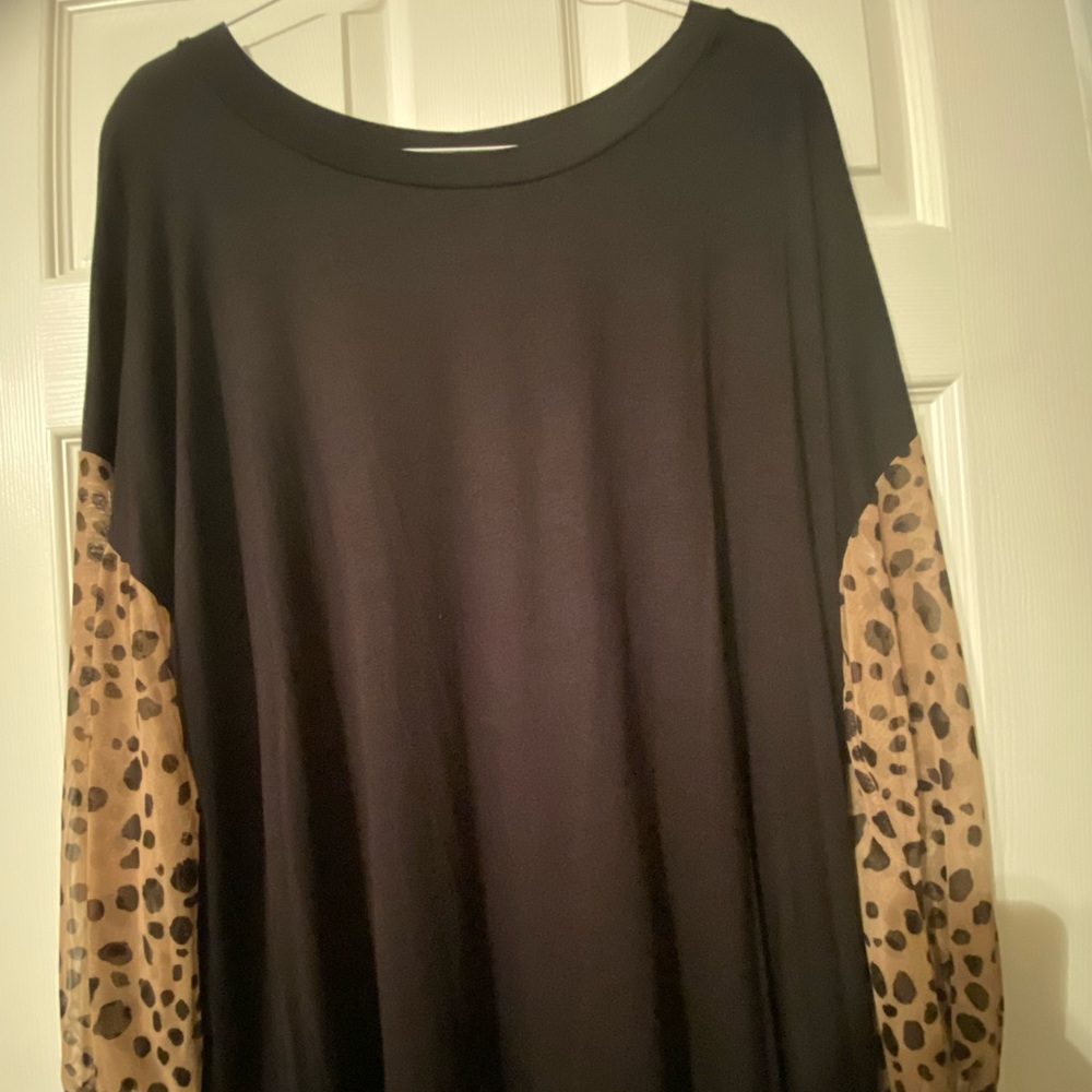 Black and leopard print top. Bought at Local boutique. Size 3x new without tags